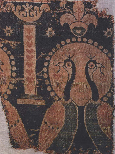 Fragment of Persian silk textile with fleur-de-lys motif in the Treasury of Aachen Cathedral. 6th century AD